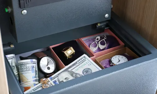 money and  jewelry in safe